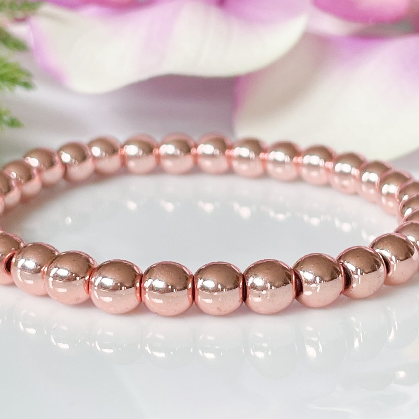 6mm plated rose gold hematite
