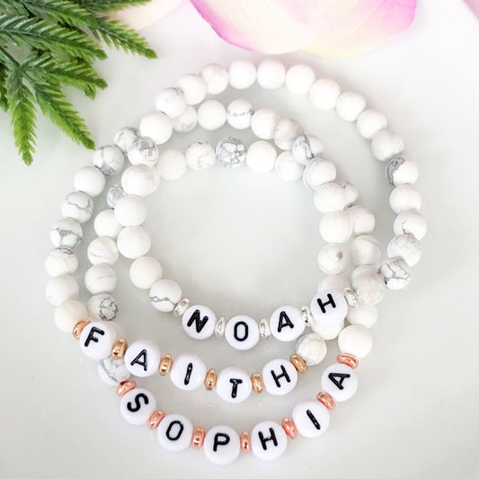 6mm Custom name beaded bracelet made with howlite beads, acrylic letter beads and metallic accents