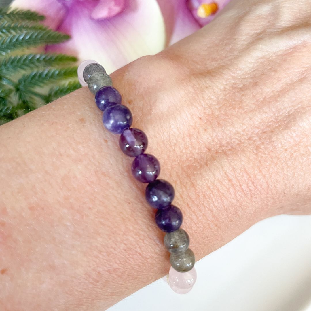 Glowing bracelet on a wrist with a soft focus background